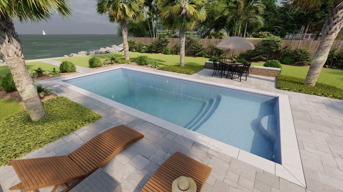 Liberty Heavenly fiberglass pool, rectangular pool with a tanning ledge, a light paver deck and wood loungers near palm trees, manufacturer photo.